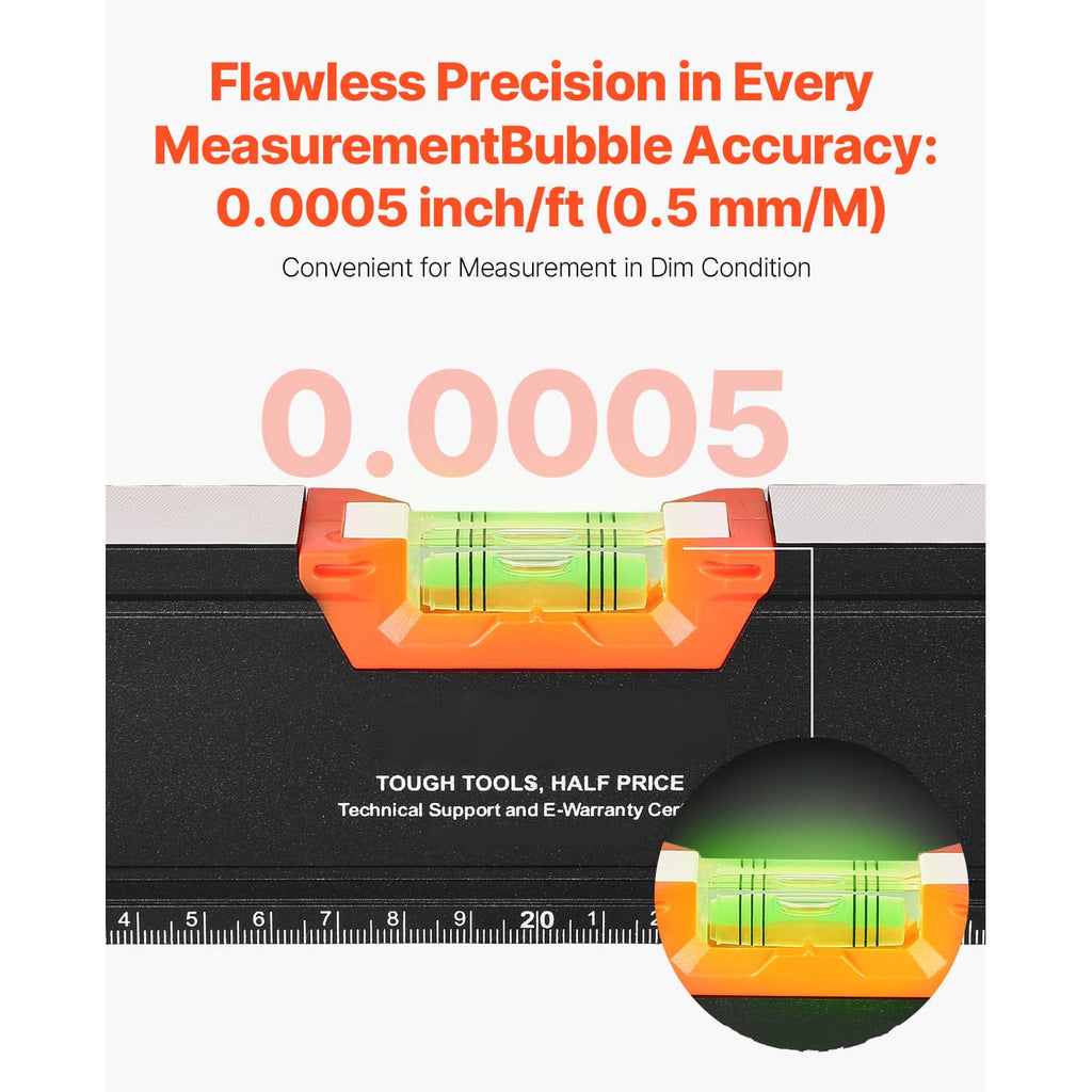 Torpedo level tool with green bubble vial in orange housing, close-up view