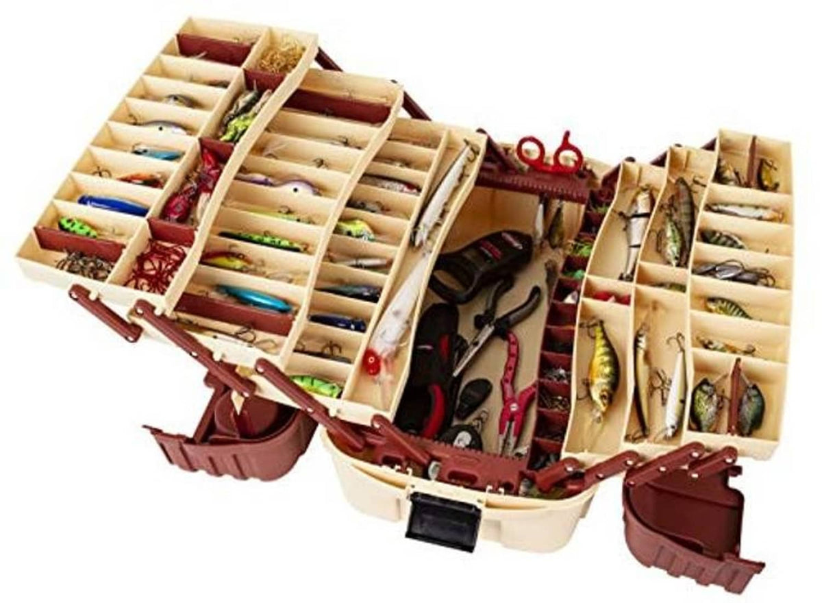 Fishing tackle box open showing numerous divided tackle compartments and mounted tools