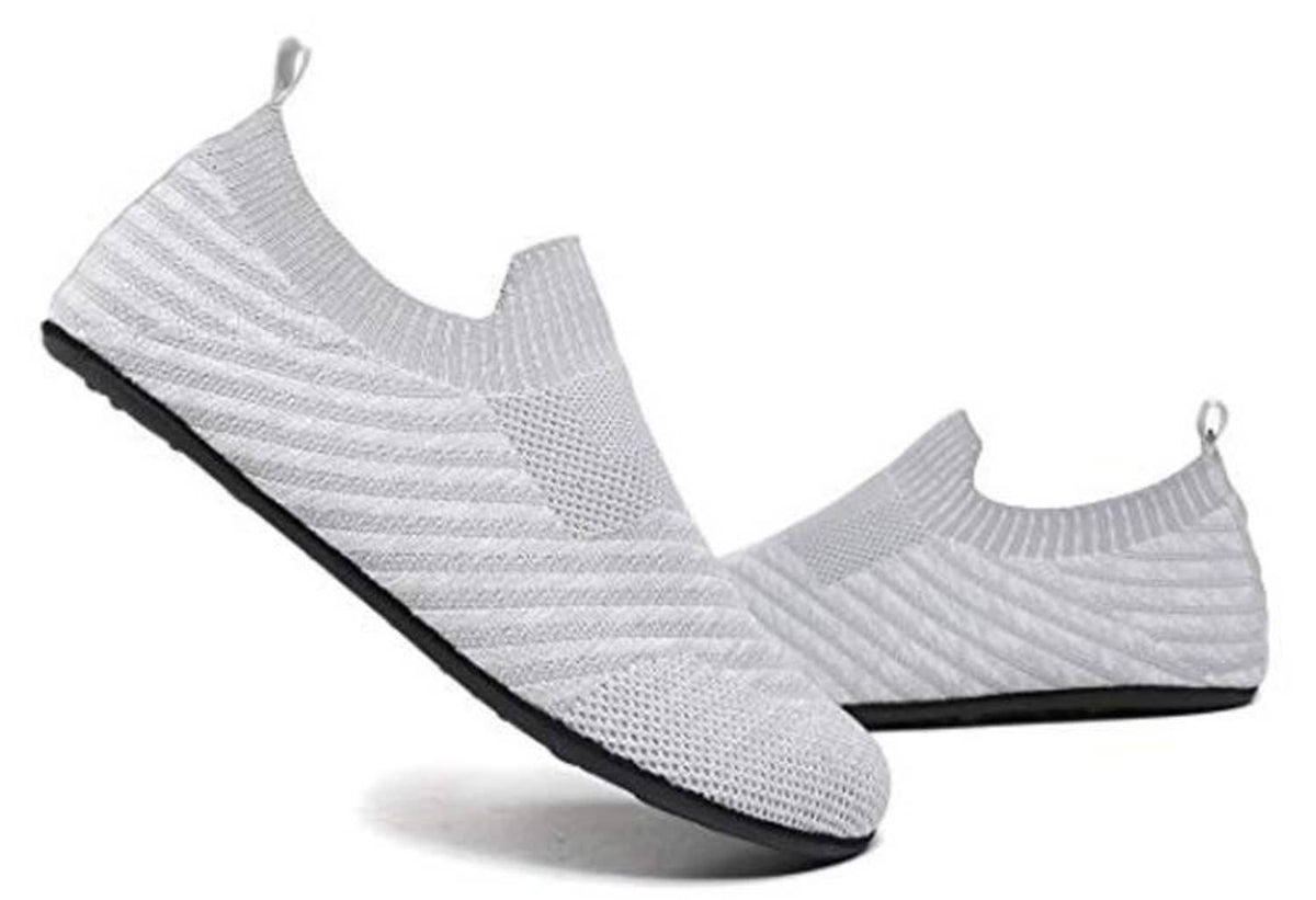 Pair of light gray slip-on knit house shoes with black edging