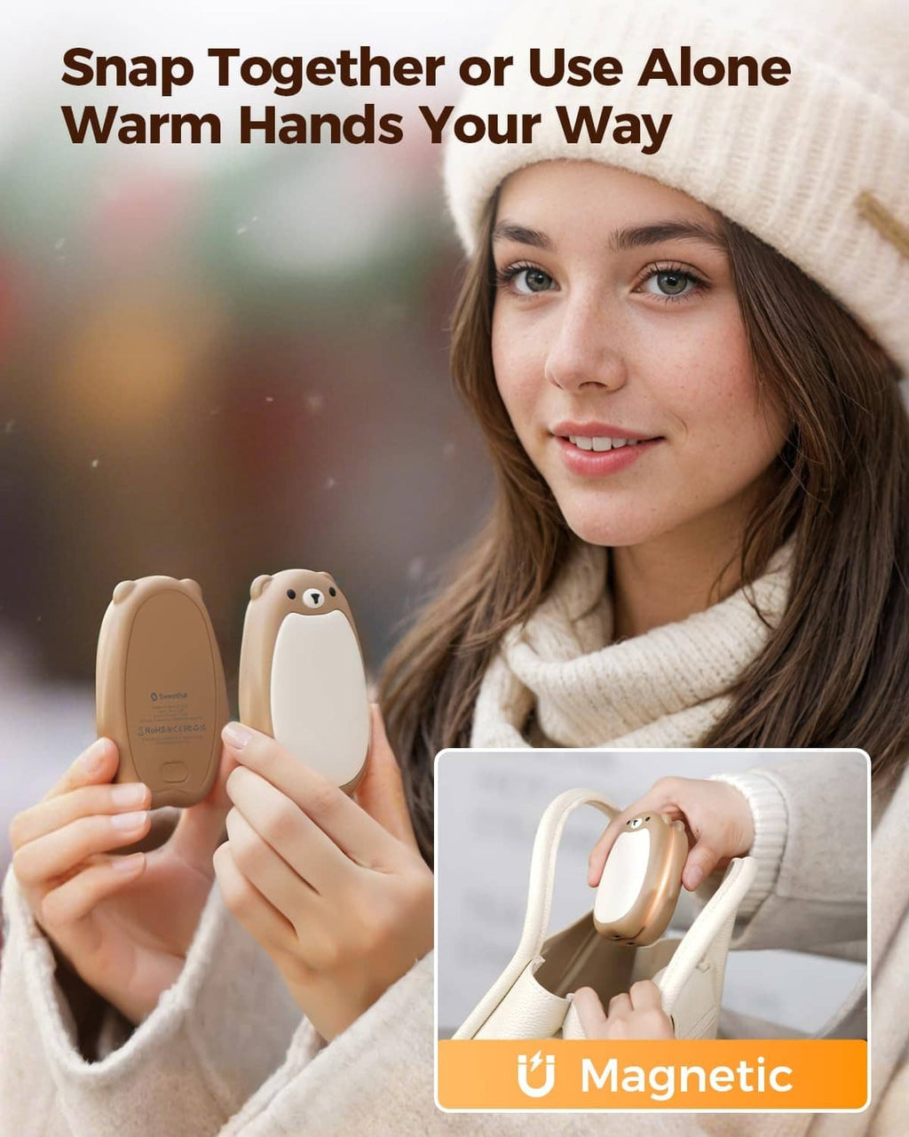 Small brown bear hand warmers, rechargeable 2-pack held in winter gloves
