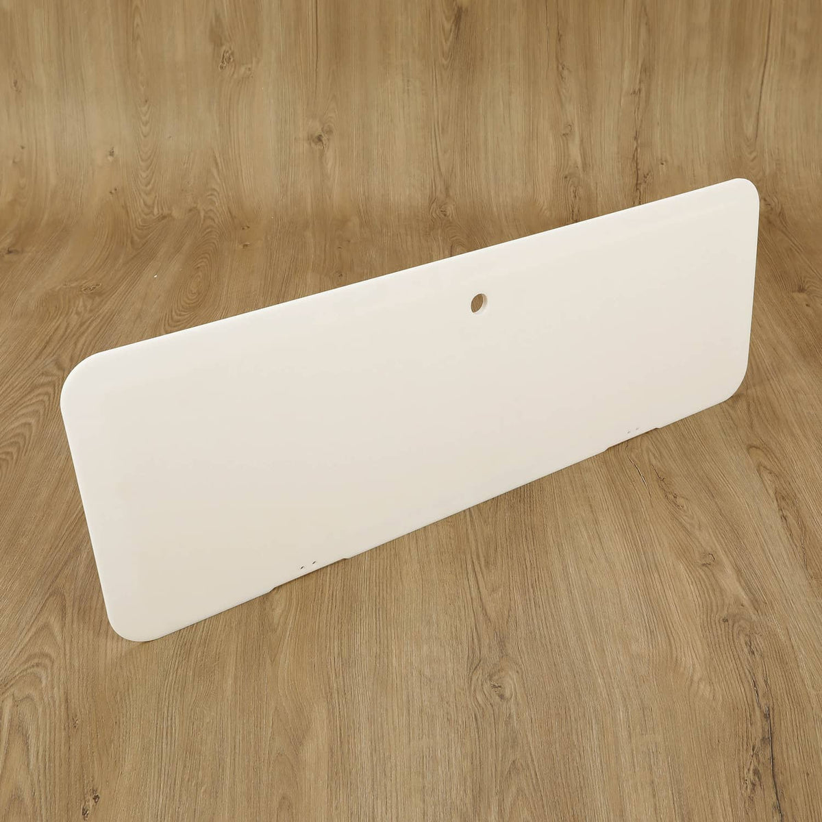 White boat locker door cover lid panel with center hole, angled view