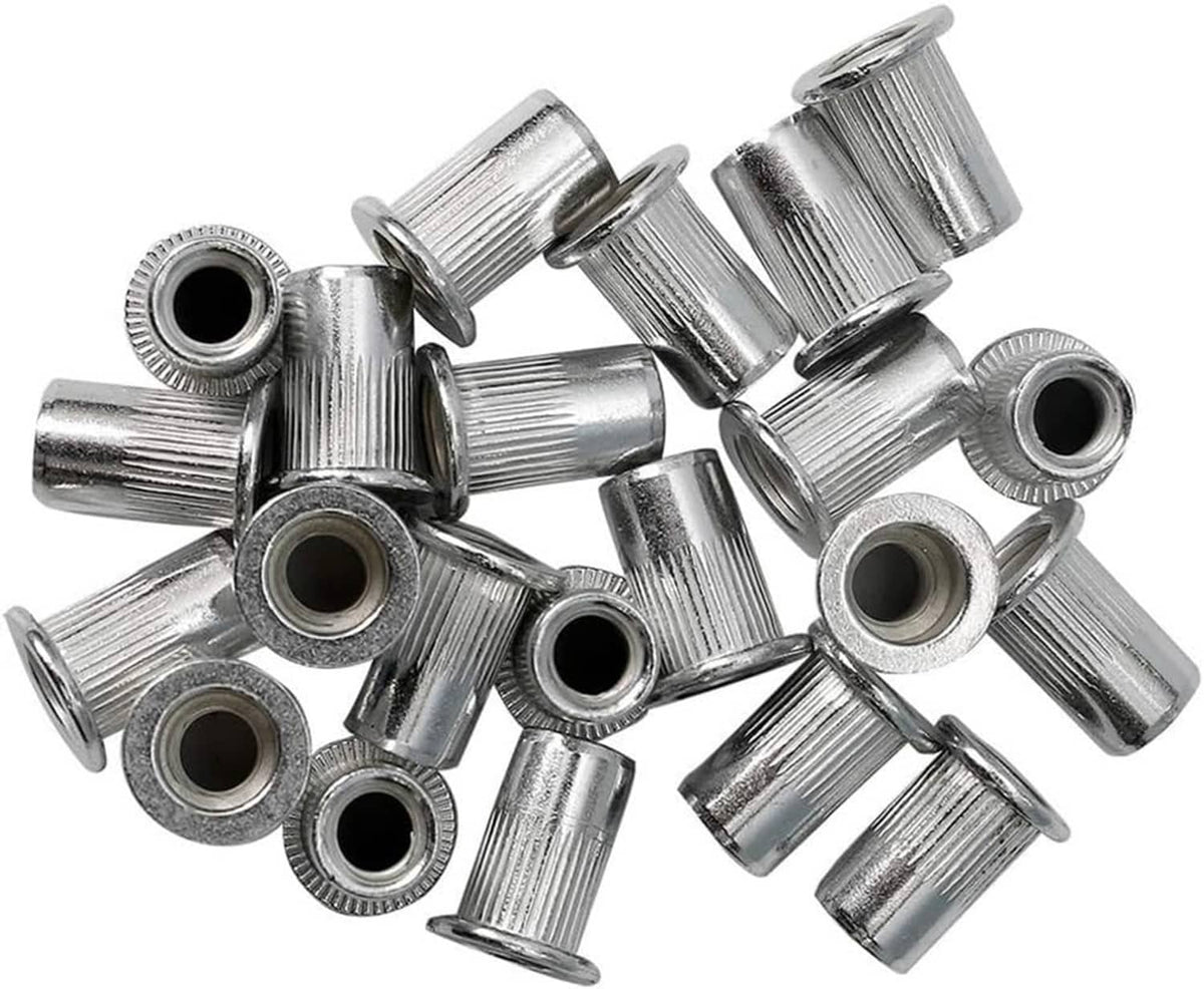 Silver aluminum rivet nuts with internal threads, angled view of multiple cylindrical inserts