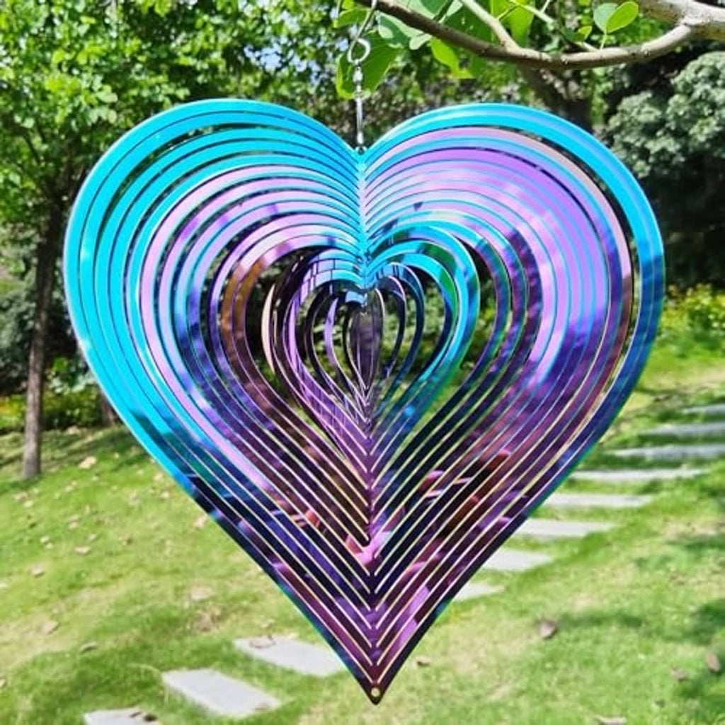 Heart yard wind chime spinner with blue top rings and rainbow spiral metal accents