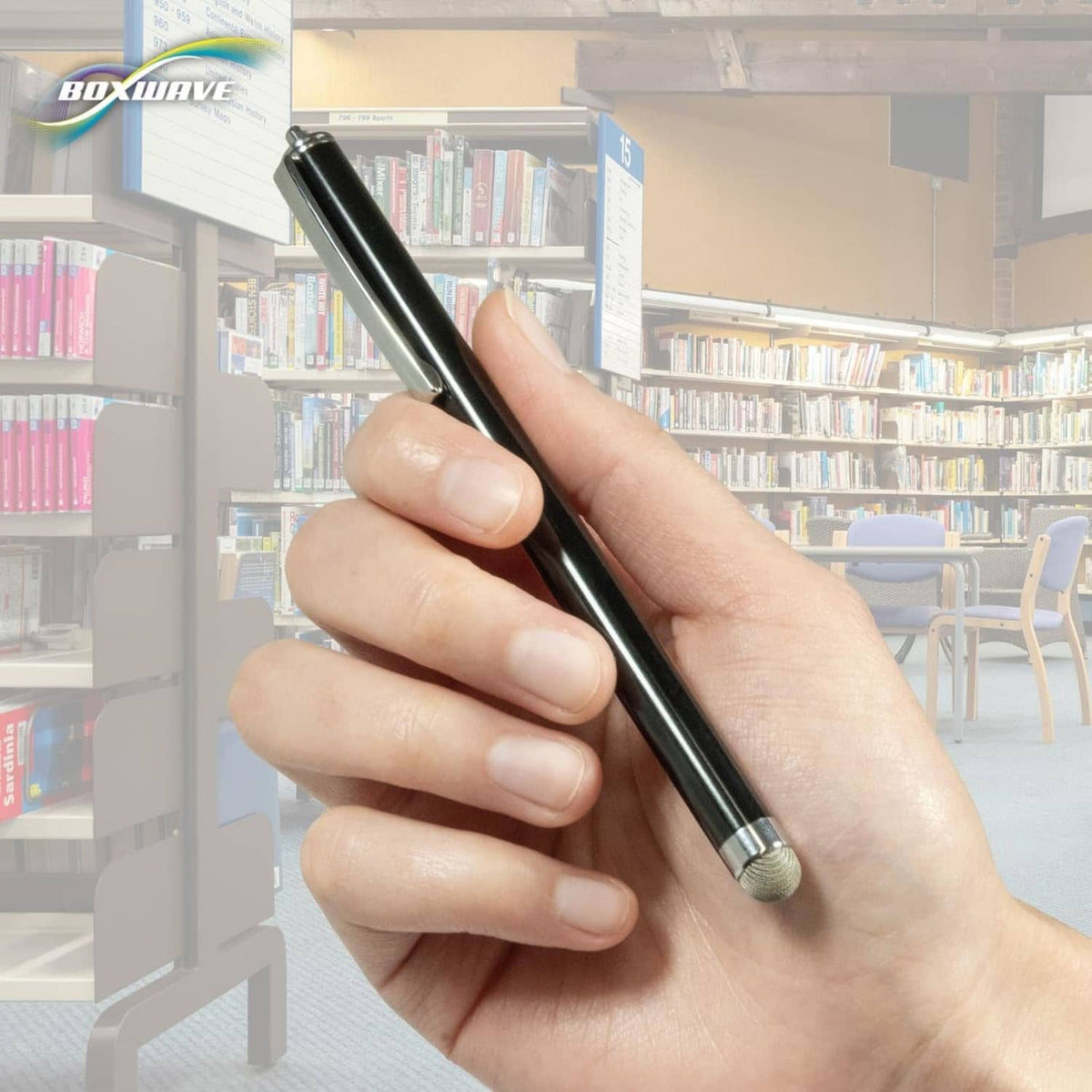 Hand holding jet-black capacitive stylus with metal tip