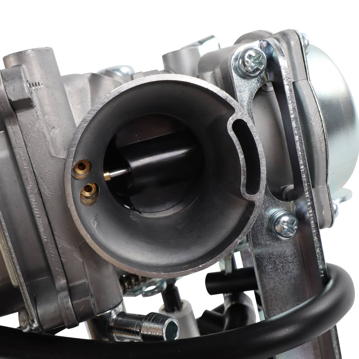 Carburetor intake bore close-up with butterfly housing and metal flange