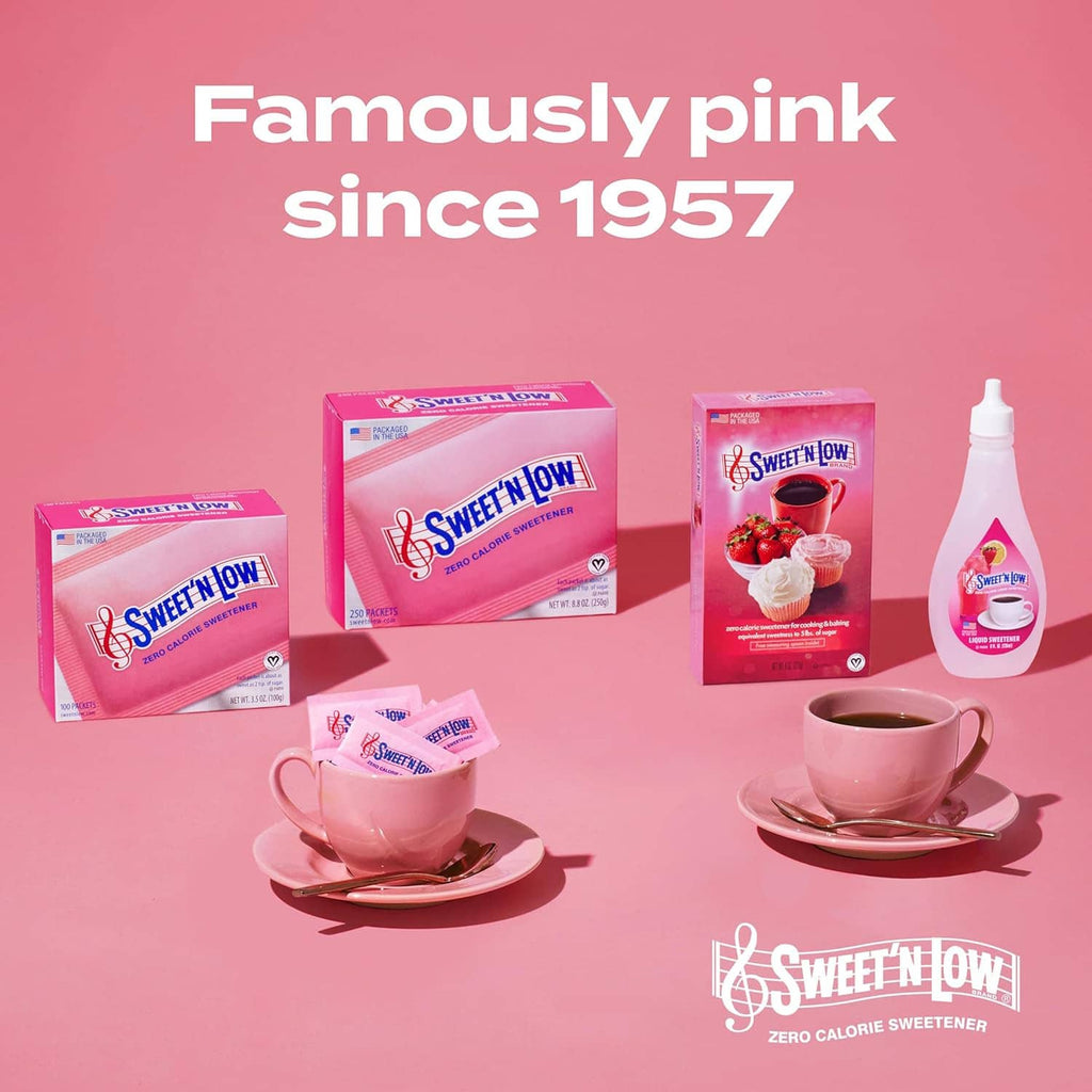 Pink-themed Sweet 'n Low lineup: boxes, sachets, liquid bottle, and coffee cups