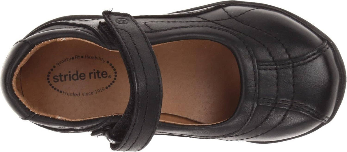 Girls' Claire black Mary Jane shoe interior view with tan lining and brand label
