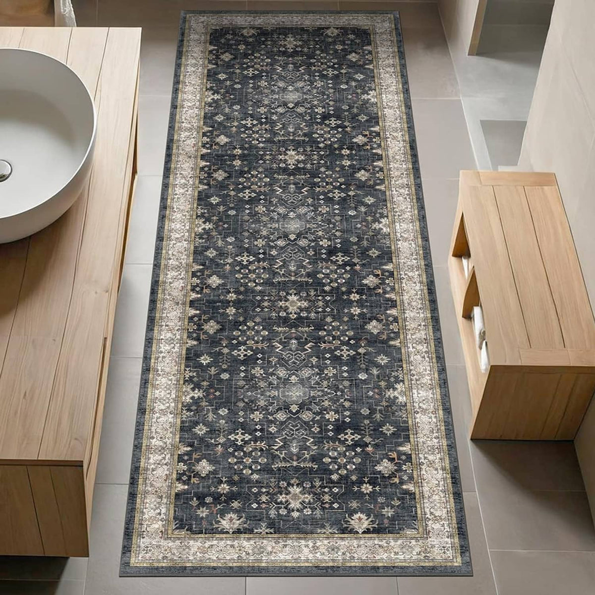 Dark boho patterned runner rug with light border and centered geometric motif