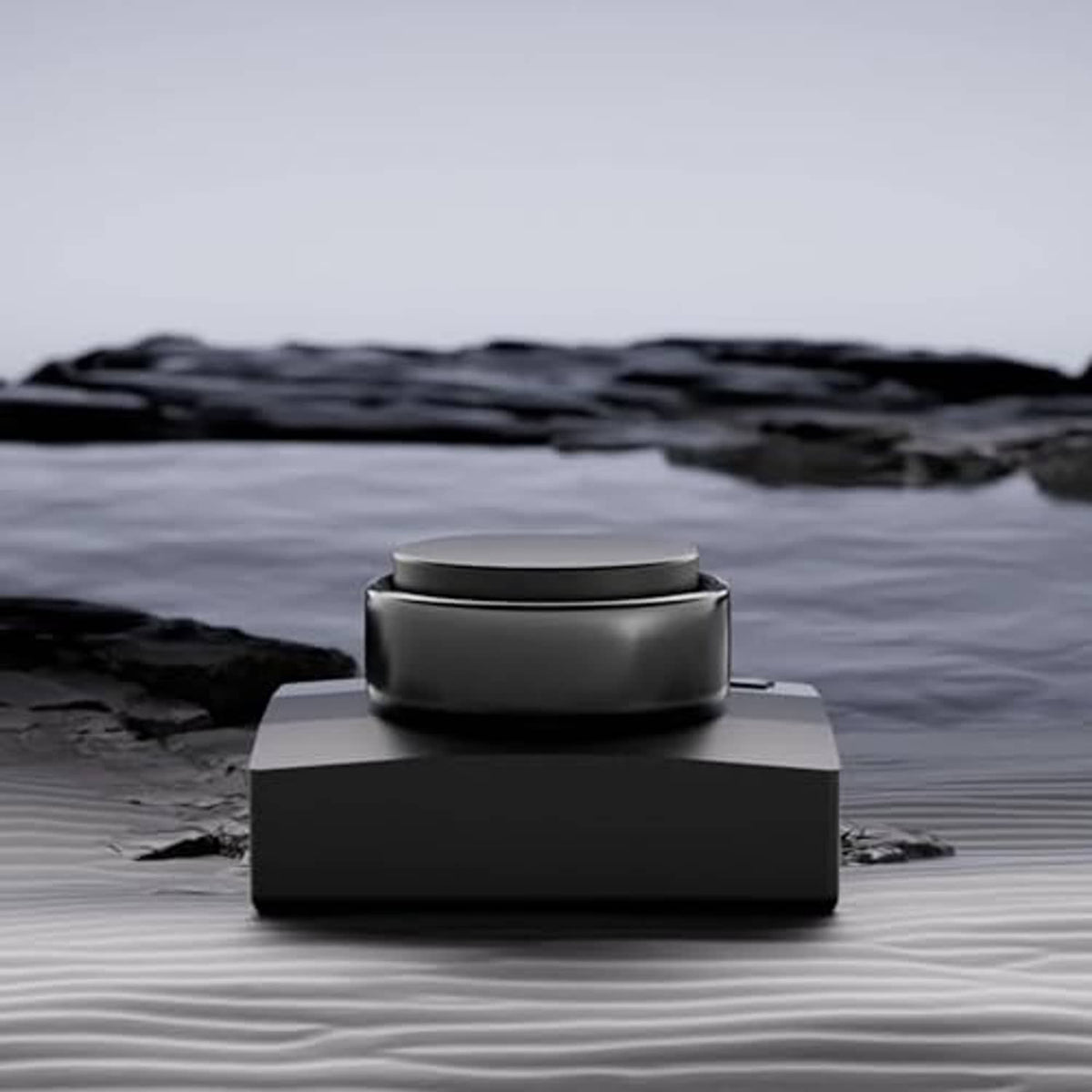 Black ring charger dock with circular top placed on a textured surface