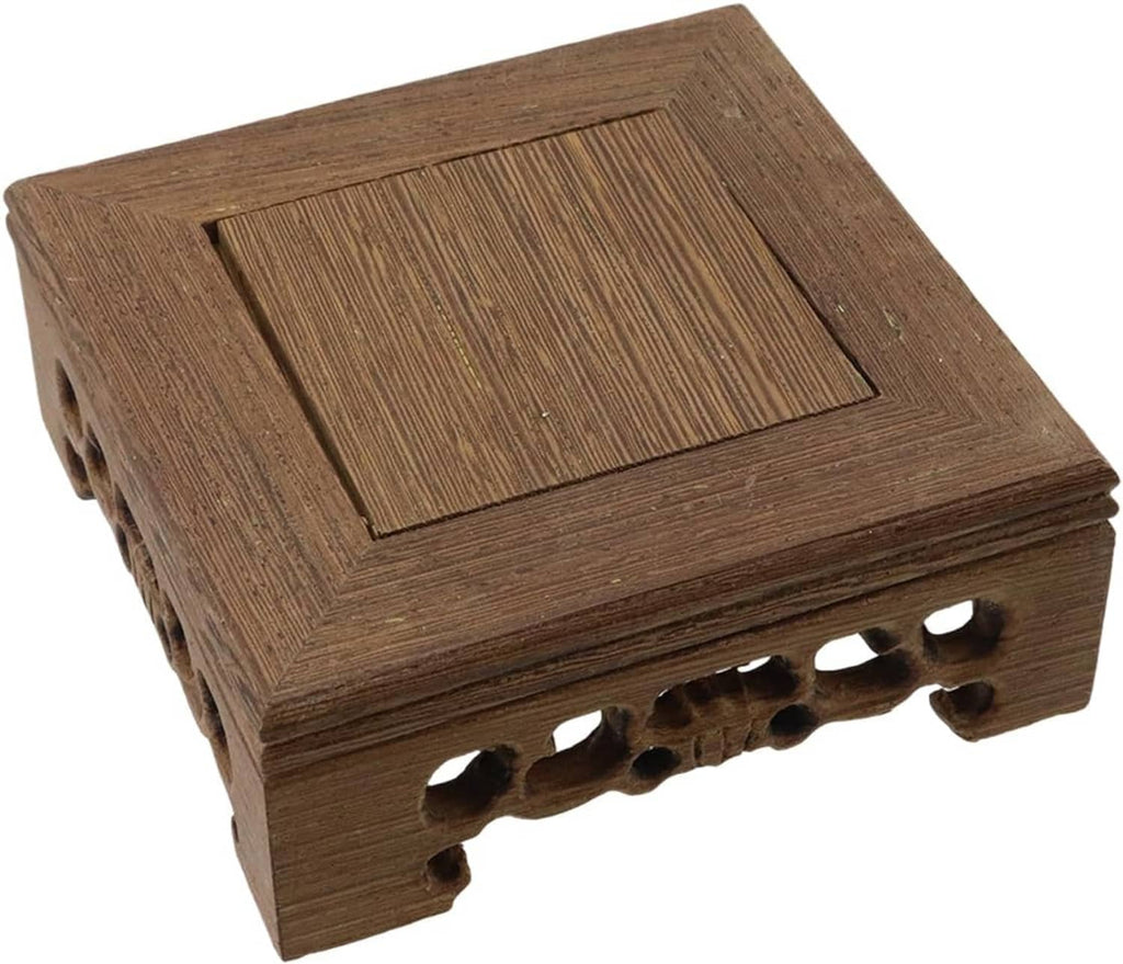 Wooden display stand base with carved square panel and row of oval cutouts
