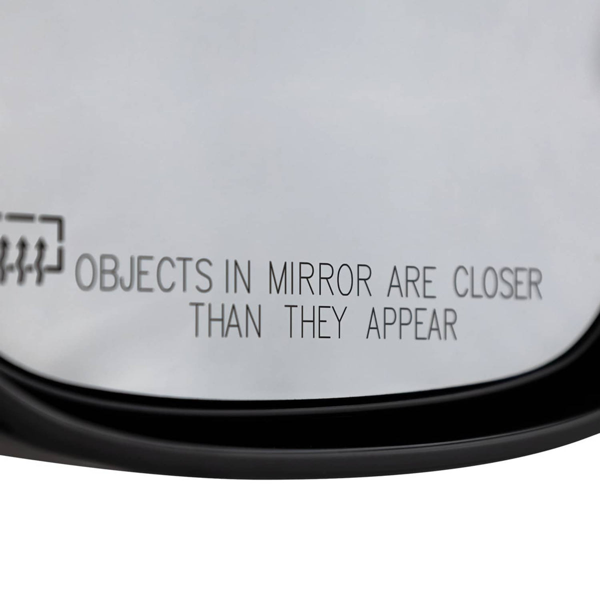 Passenger side heated mirror edge with black bezel and tinted glass