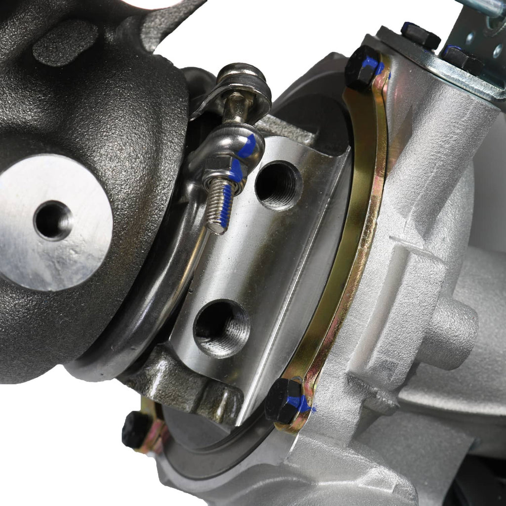Close-up of turbocharger compressor housing with bolts and sensor wiring connections.