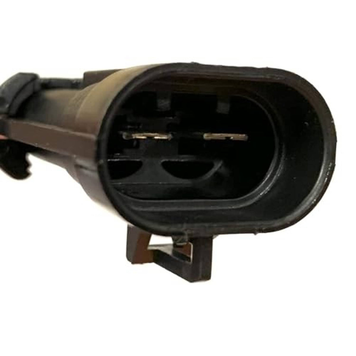 Fan power connector at rear of shrouded motor housing with exposed contacts