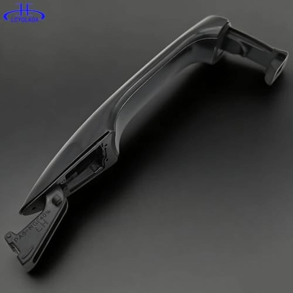 Rear side of black front left exterior door handle with mounting plate and clips