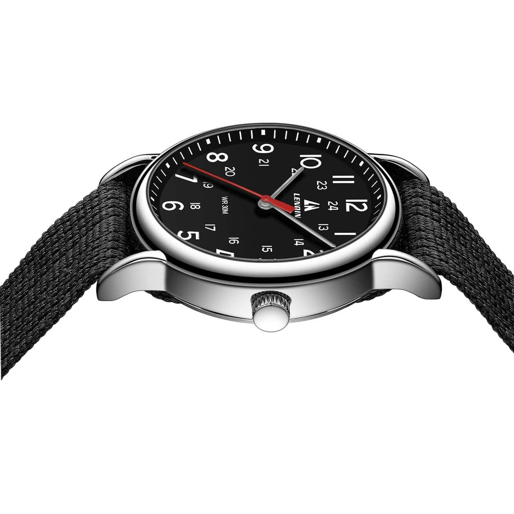 Men's analog sport watch top view with black dial, silver bezel, black textured strap