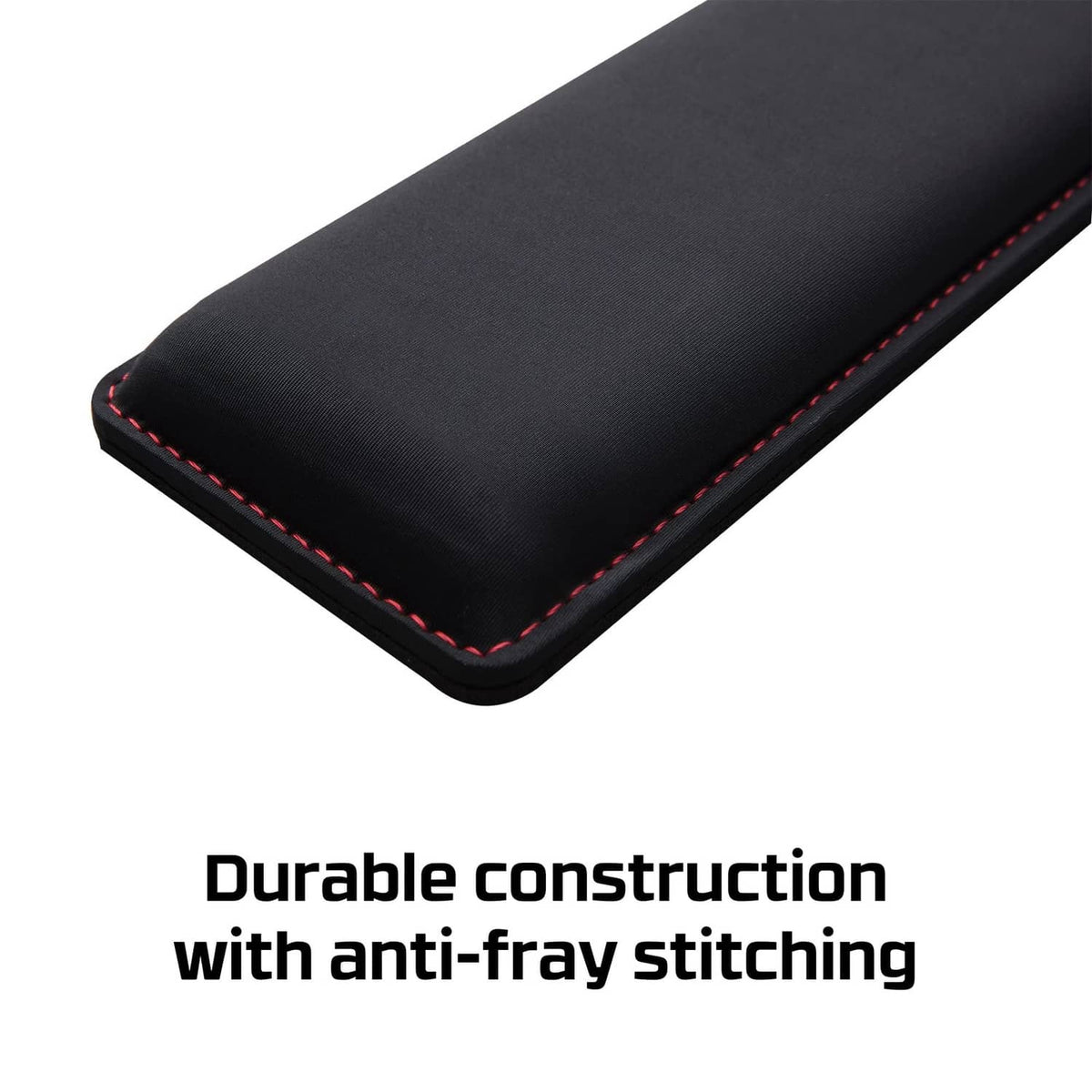 HyperX black wrist rest corner with rounded edge and red anti-fray stitching