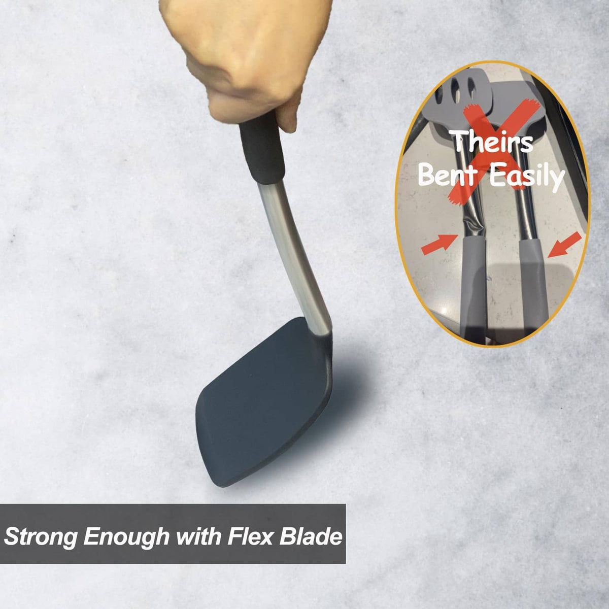 Black silicone spatula with flexible blade shown under hand pressure