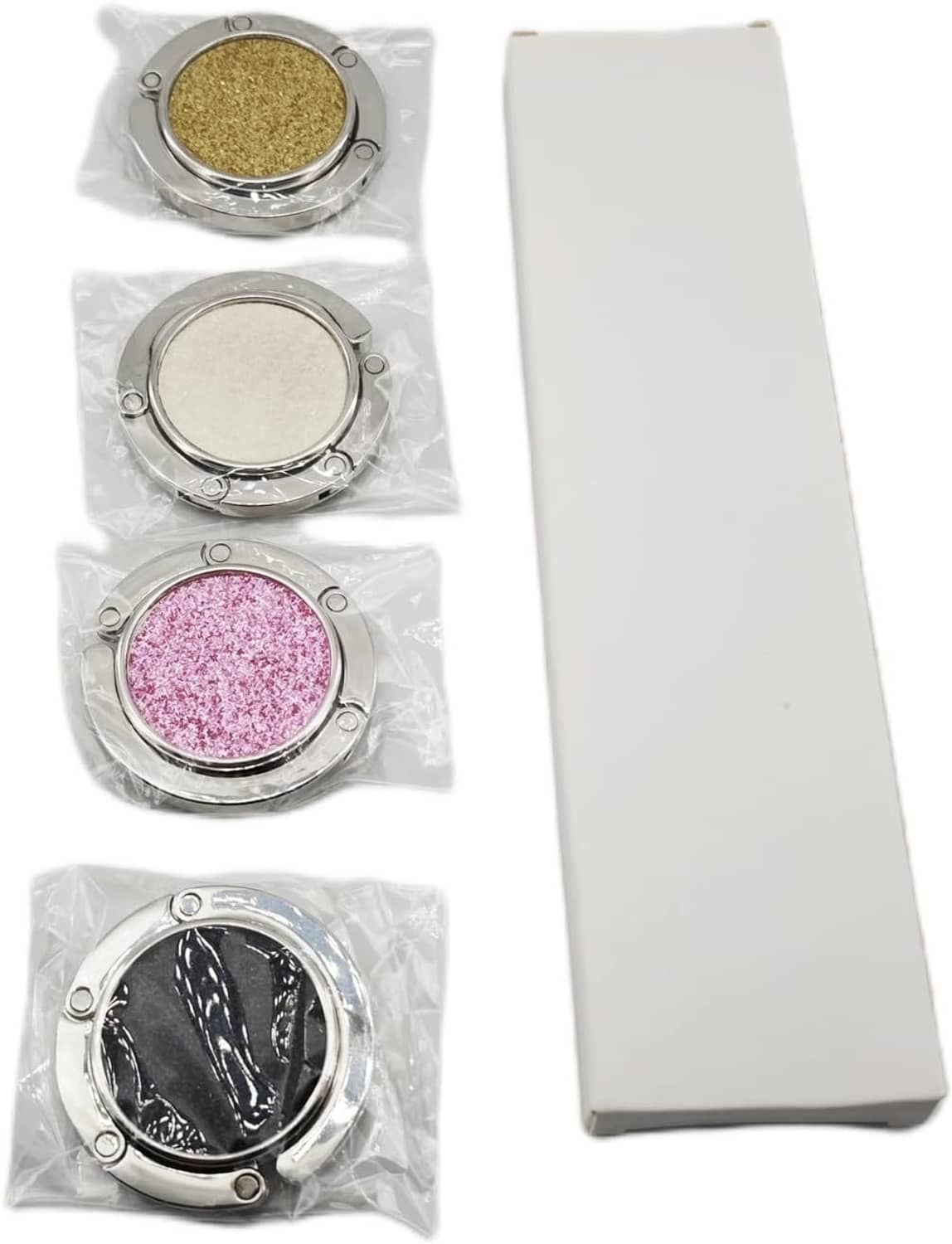 4-pack foldable purse hooks in plastic bags with glitter pads: gold, white, pink, dark gray