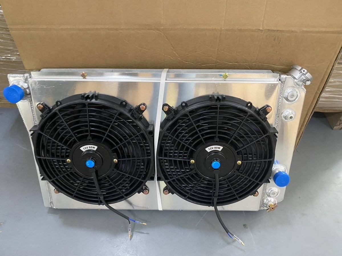 Aluminum radiator and dual black cooling fans with blue power leads
