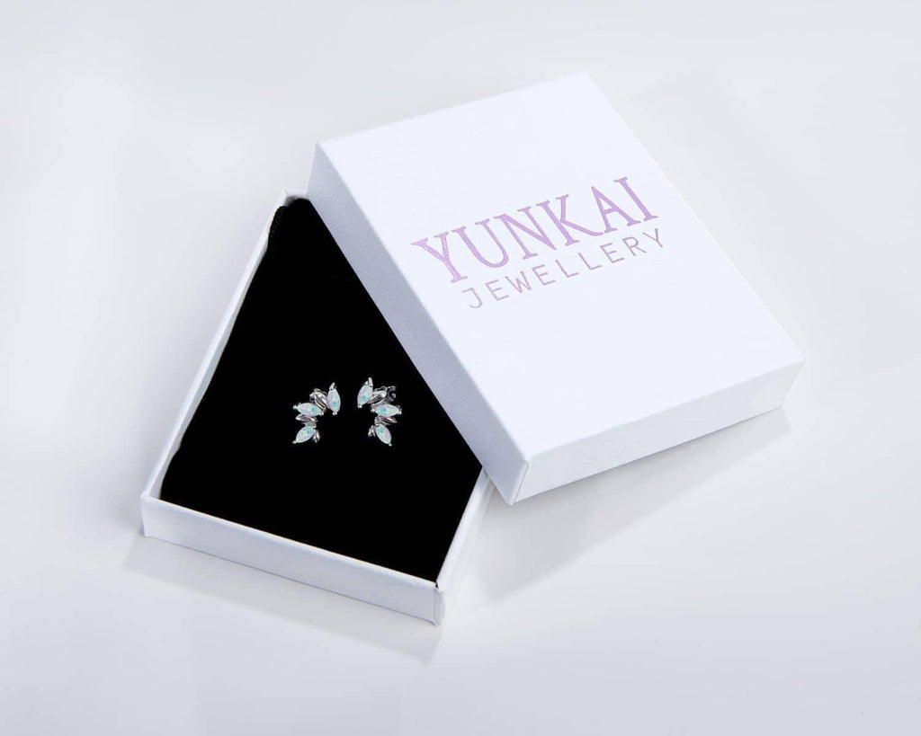 Sterling silver opal stud earrings shown in gift box, marquise opal stones