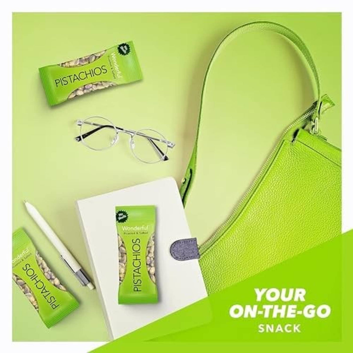 Wonderful Pistachios snack pouches with glasses, notebook, and green zip pouch