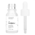 Hair growth inhibitor serum bottle with dropper and clear liquid tube