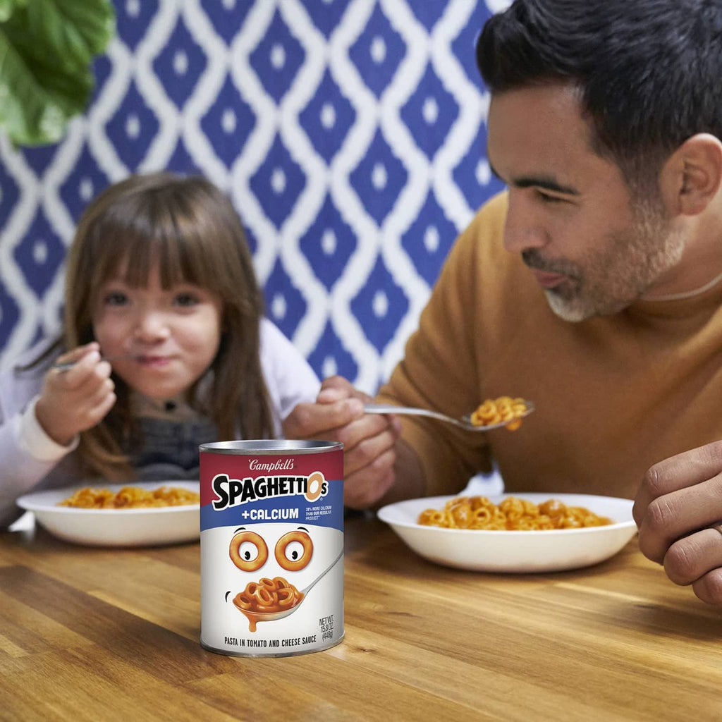 Campbell’s Spaghettios +Calcium canned pasta can on table with bowls