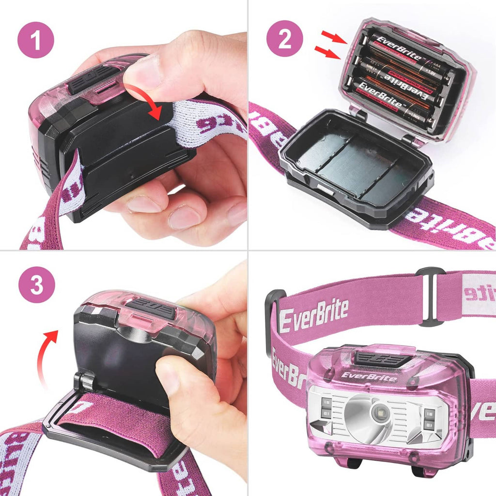 Pink kids headlamp with removable battery cover and adjustable elastic head strap.