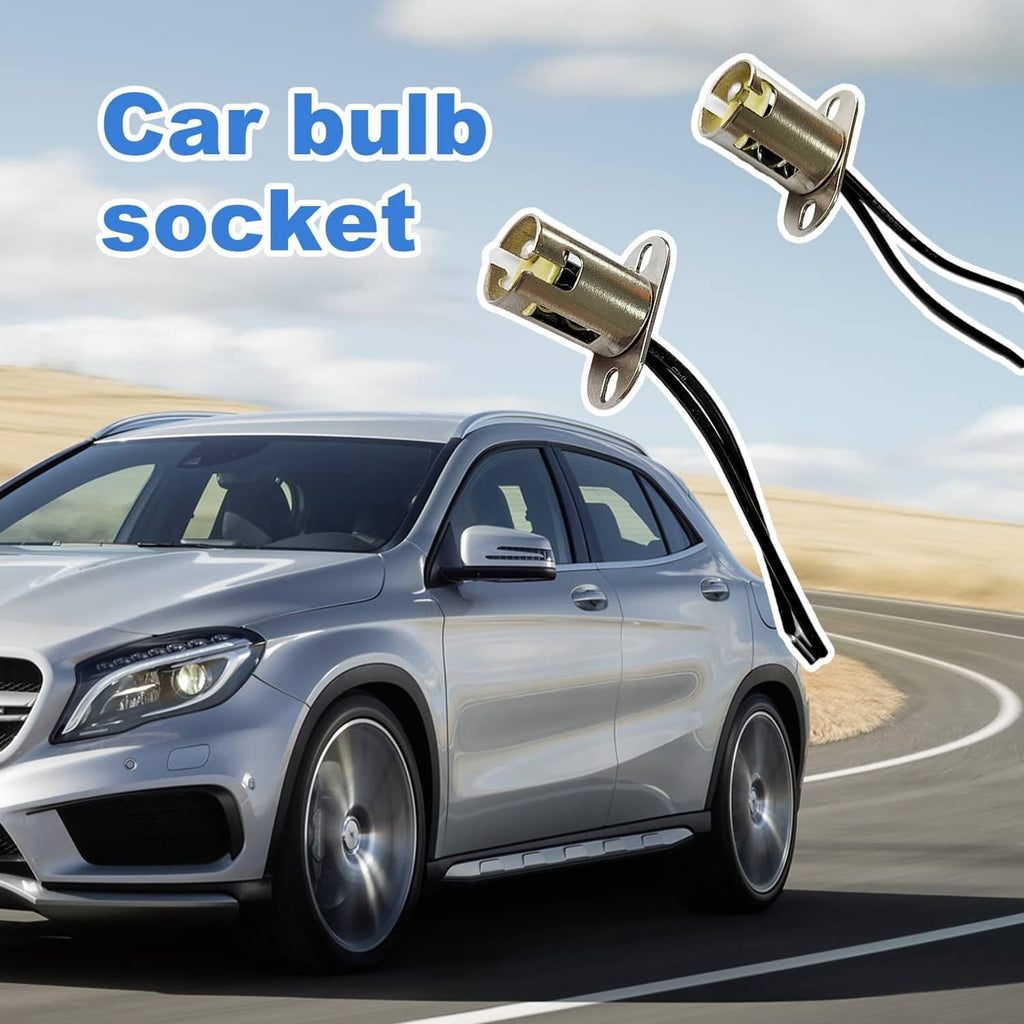 Car bulb socket pair with black wire leads and round mounting tabs, BAY15D/1157