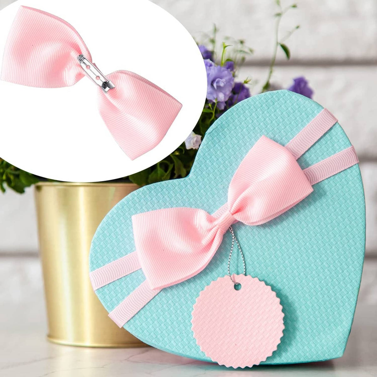 Light blue heart tag with pink bow and silver bar pin clasp attachment