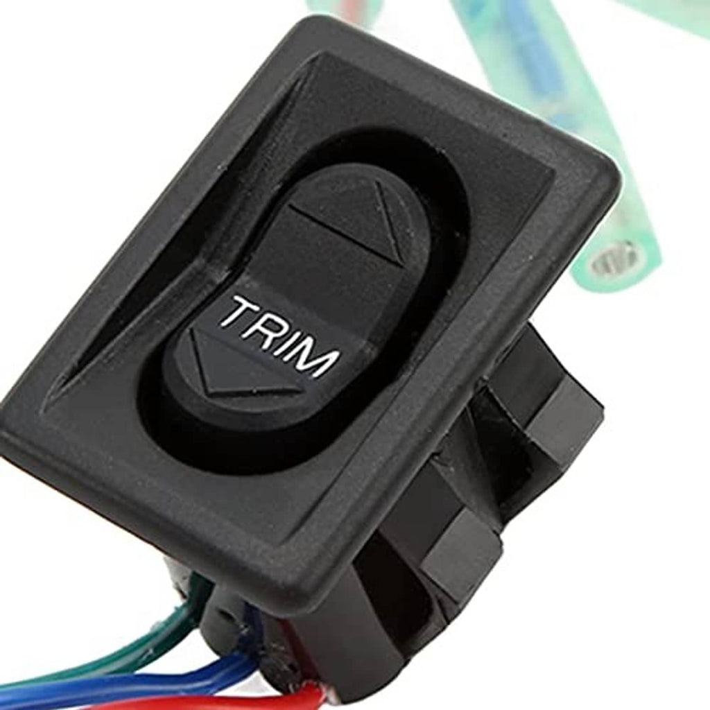 Close-up of black TRIM tilt switch with TRIM button and mounting tabs