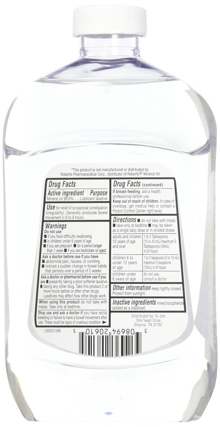 Swan mineral oil bottle back label with Drug Facts and directions, white cap