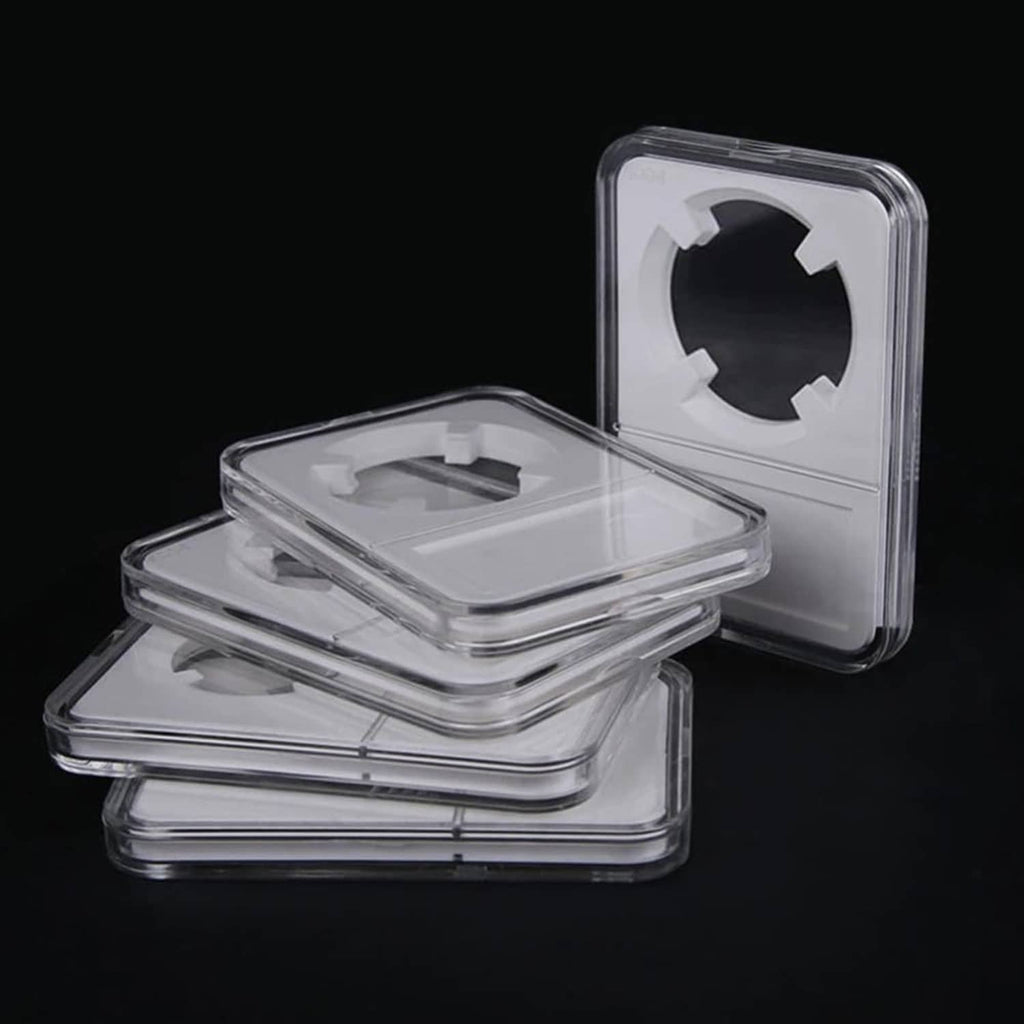 Stack of acrylic coin slab holders, clear cases with round coin openings
