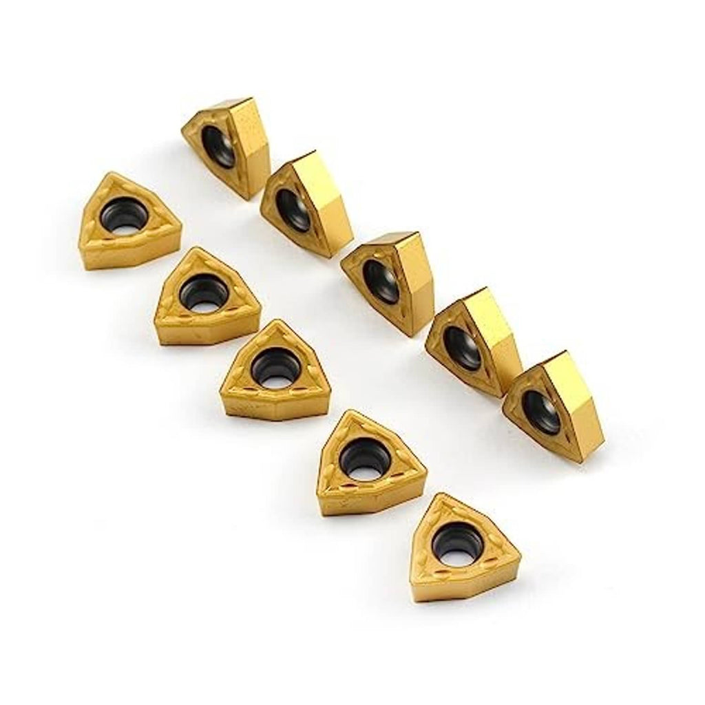 Carbide turning inserts, triangular gold tips with round hole, some side views