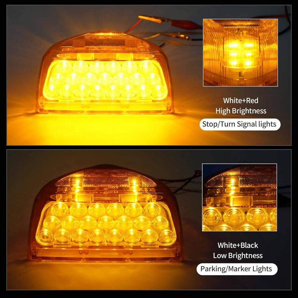 Pair of amber LED headlight/turn signal clearance lights showing LED array glow