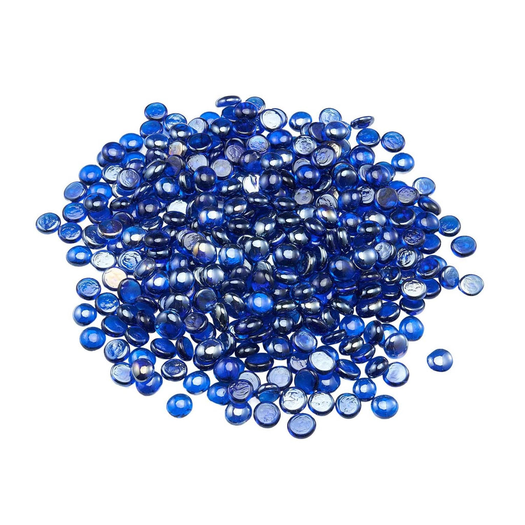 Scattered cobalt blue round fire pit glass rocks, reflective glass bead pile