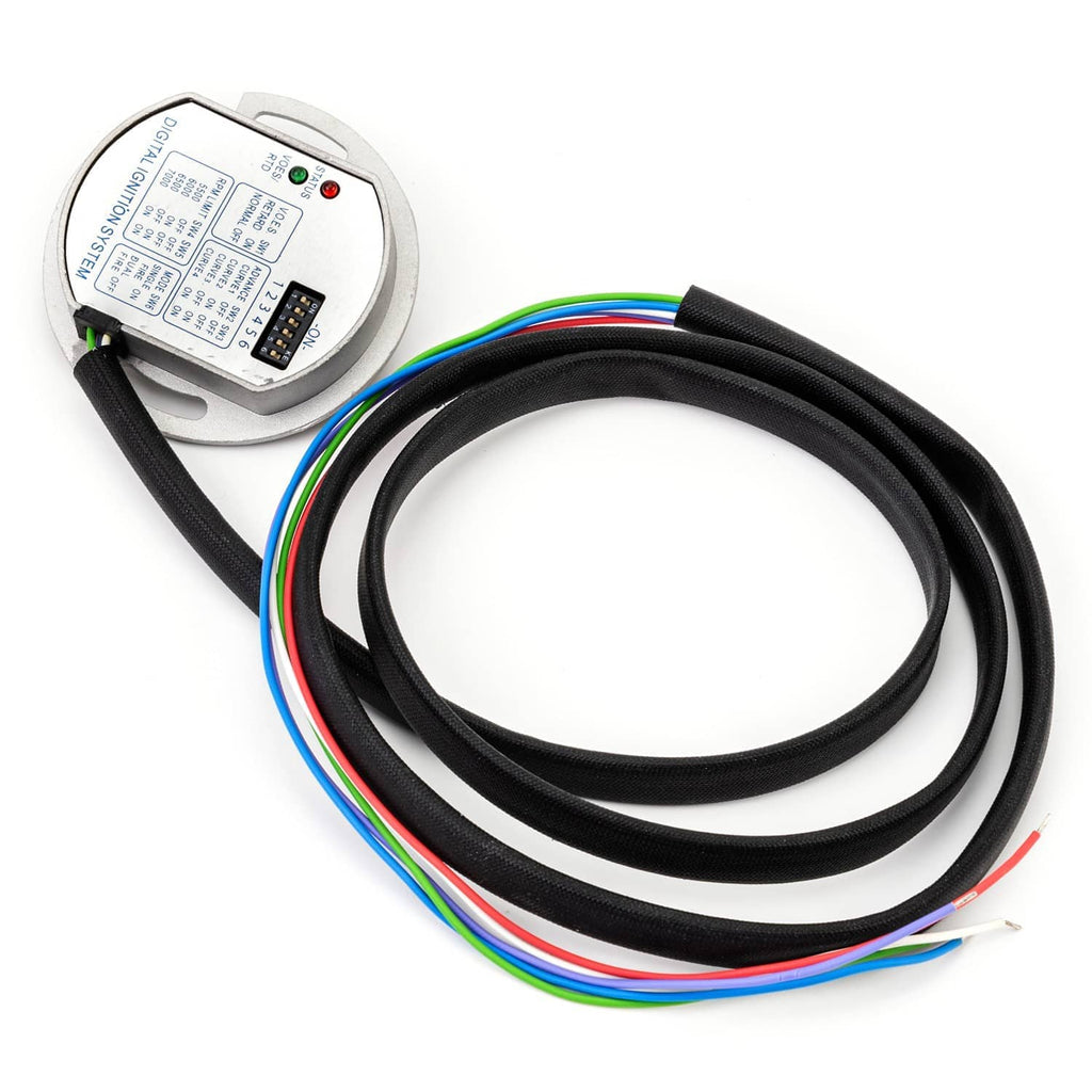 Ignition module with black cable leads and bundled multicolor wiring, close-up