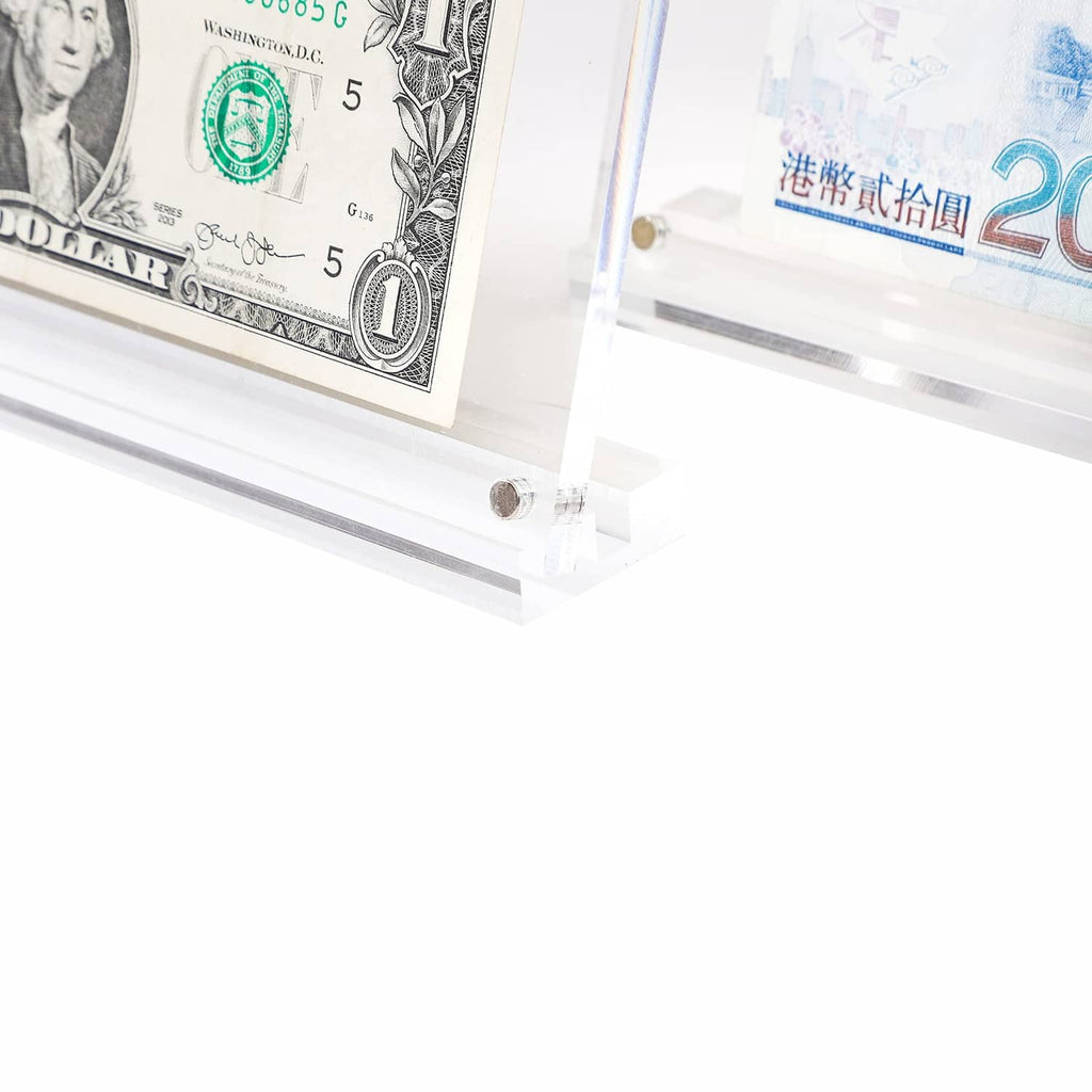 Clear acrylic corner with metal screws on a money display case