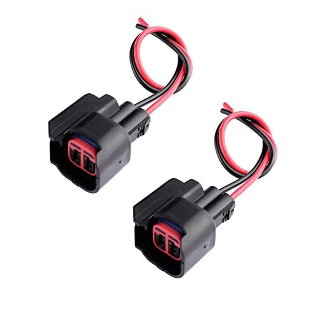 Fuel injector connector pair with red and black wire leads, gray housings and red ports