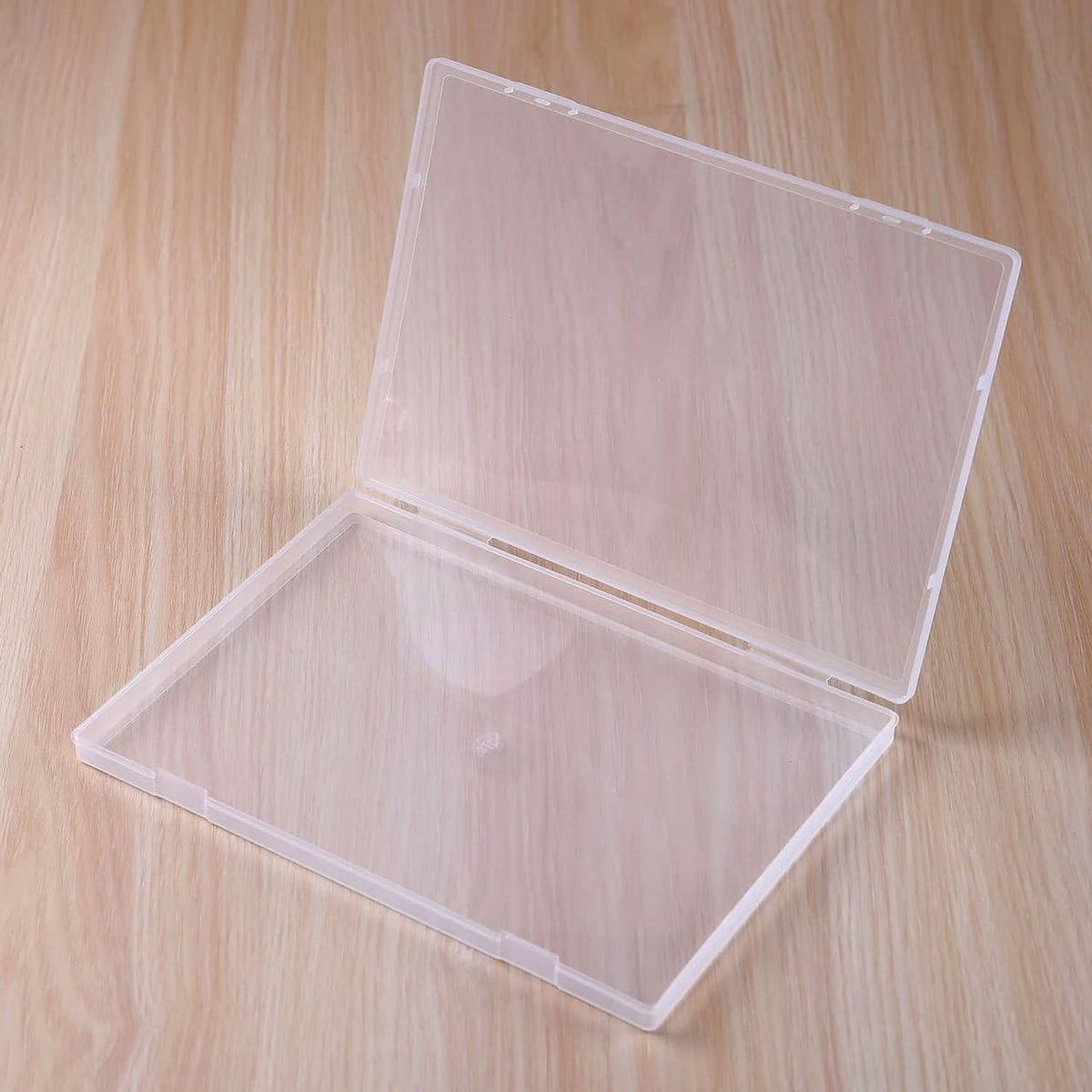 Clear plastic document storage box with hinged lid, open and empty