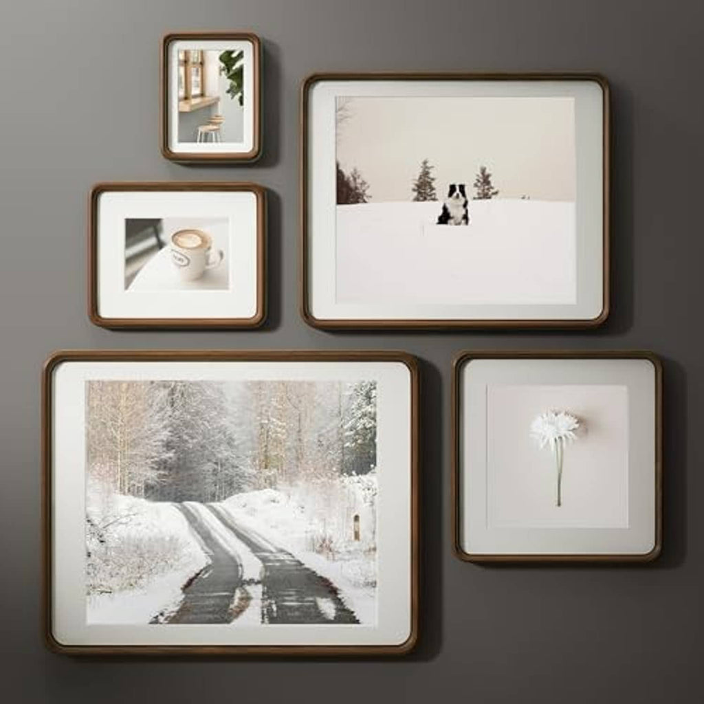 Walnut picture frame set with white mats, showing landscape photo prints