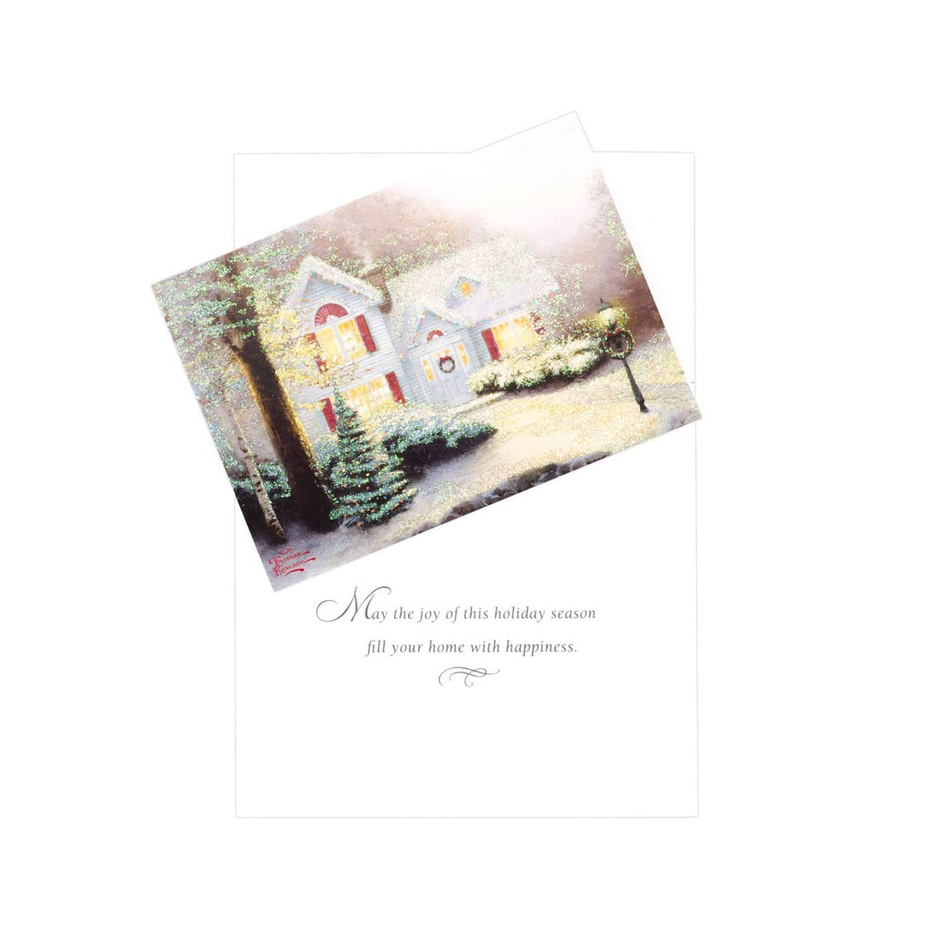Christmas greeting card showing snowy house scene with printed holiday message