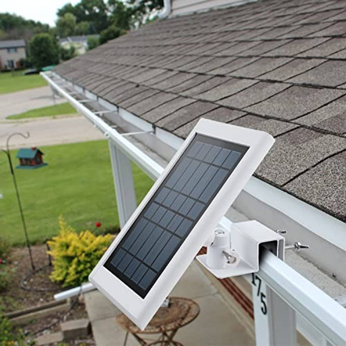 White gutter solar panel mount installed along roof edge with clamp hardware