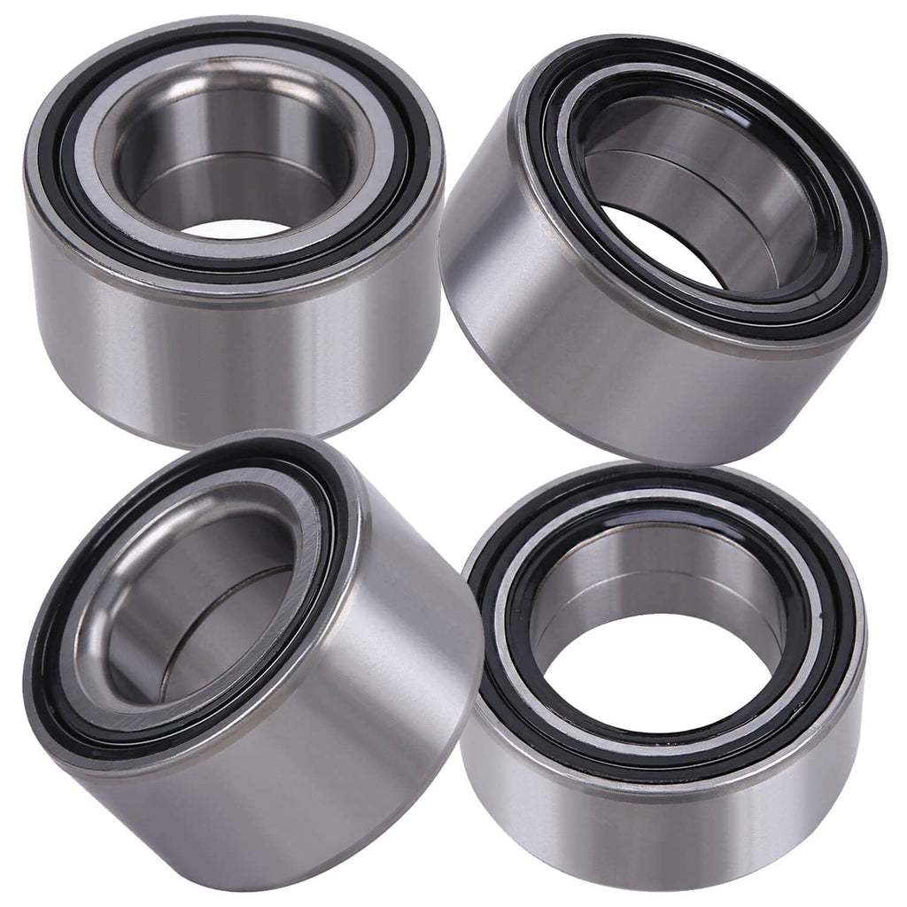 Four wheel bearings shown at angles, with silver outer housing and black sealing ring