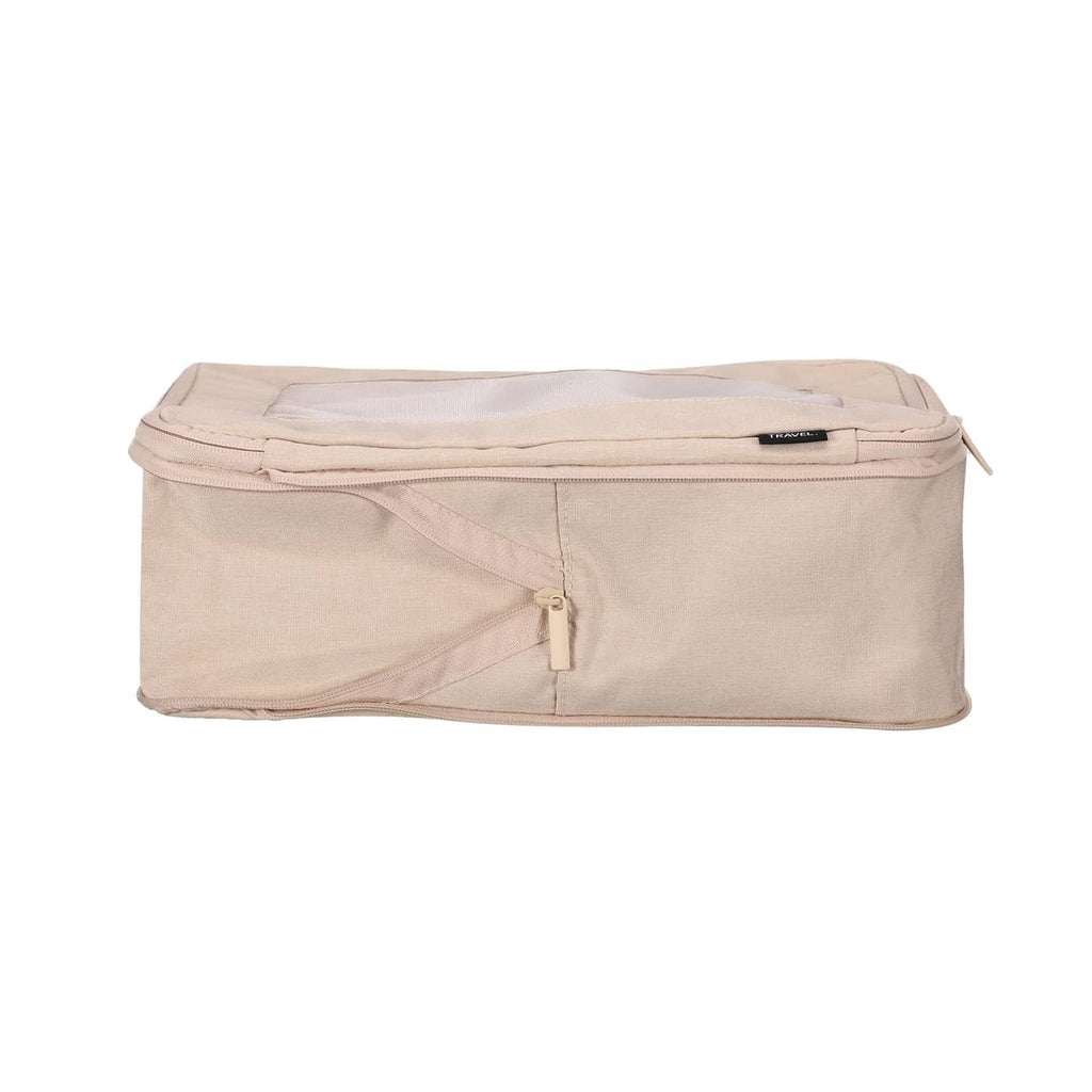 Beige packing cube with top fold, zip closure, and reinforced seam edges