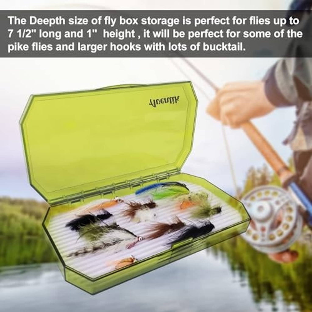 Open green fly box with clear lid and foam insert, assorted flies inside