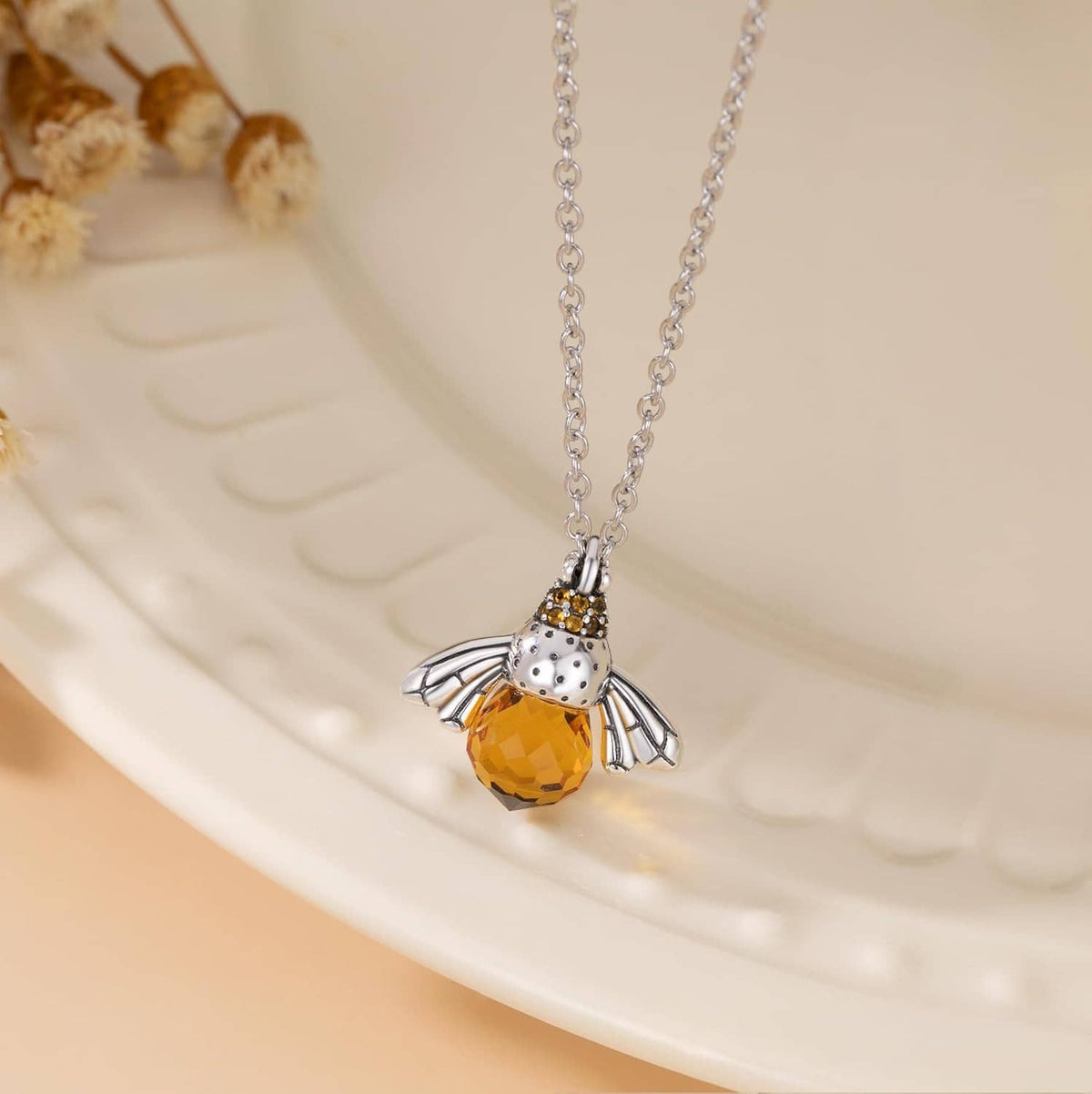 Sterling silver bee pendant necklace with amber crystal drop and detailed wings