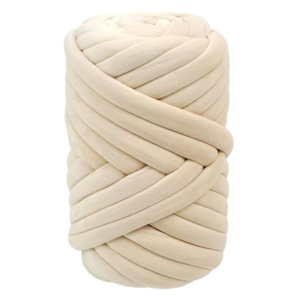 Beige chunky arm-knitting yarn ball with thick braided loops.