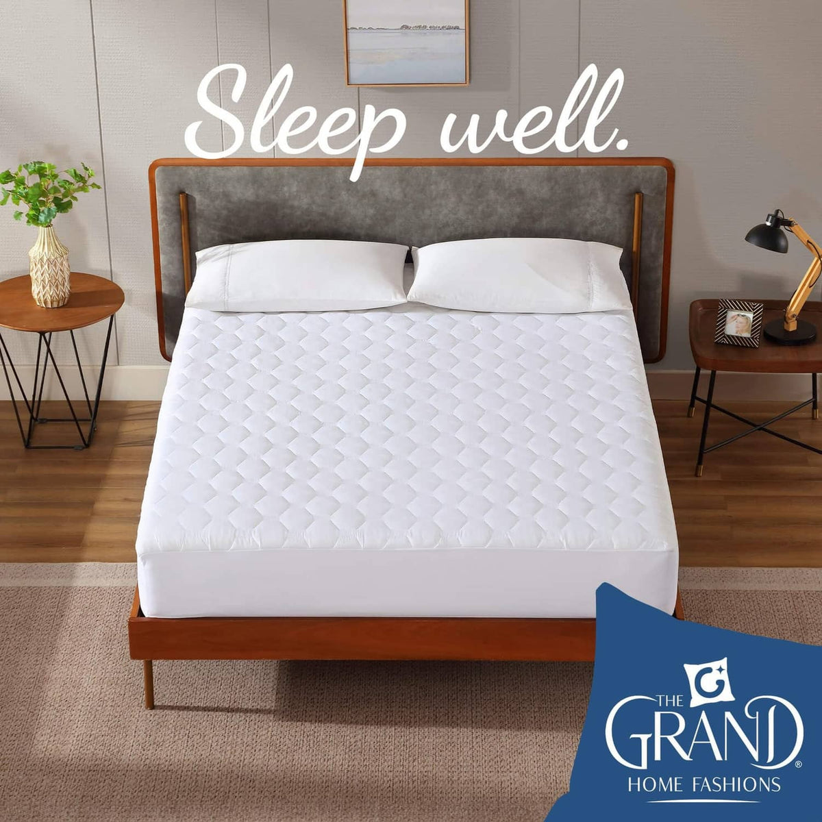 White quilted mattress pad protector neatly covering the bed