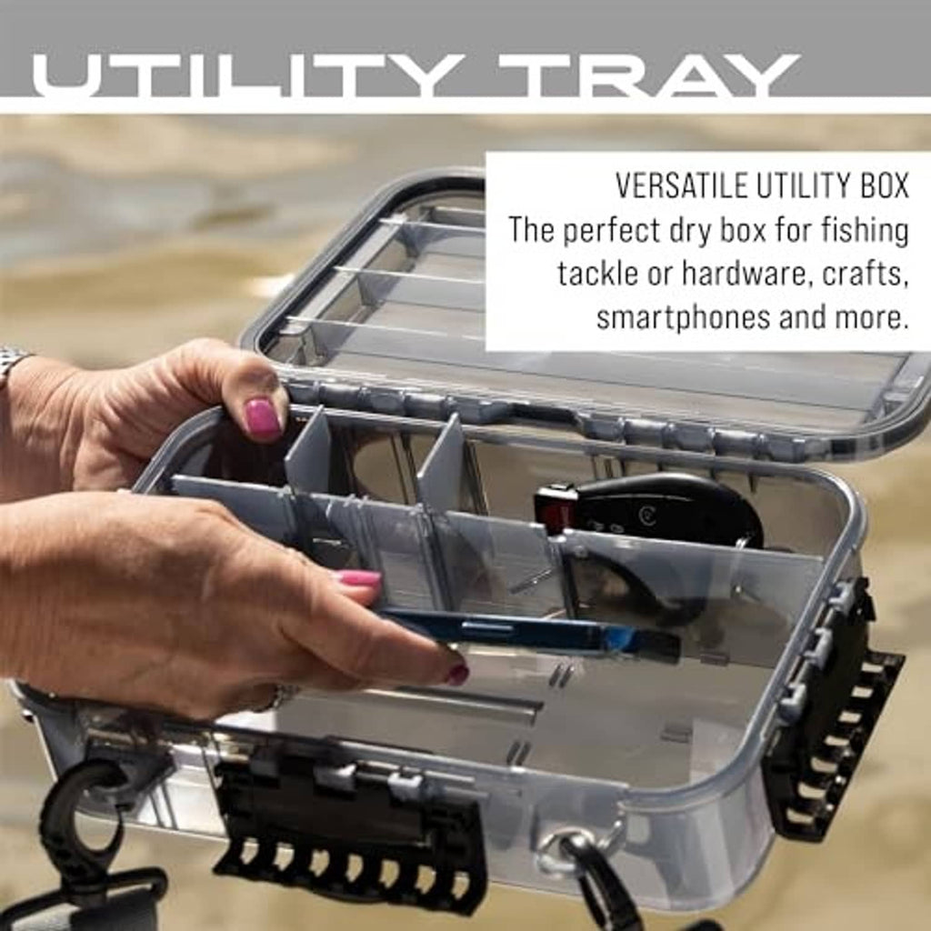 Hand lifting interior tray from clear-lidded waterproof utility box